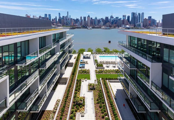Lennar 1200 Avenue riverfront development views of Manhattan in background